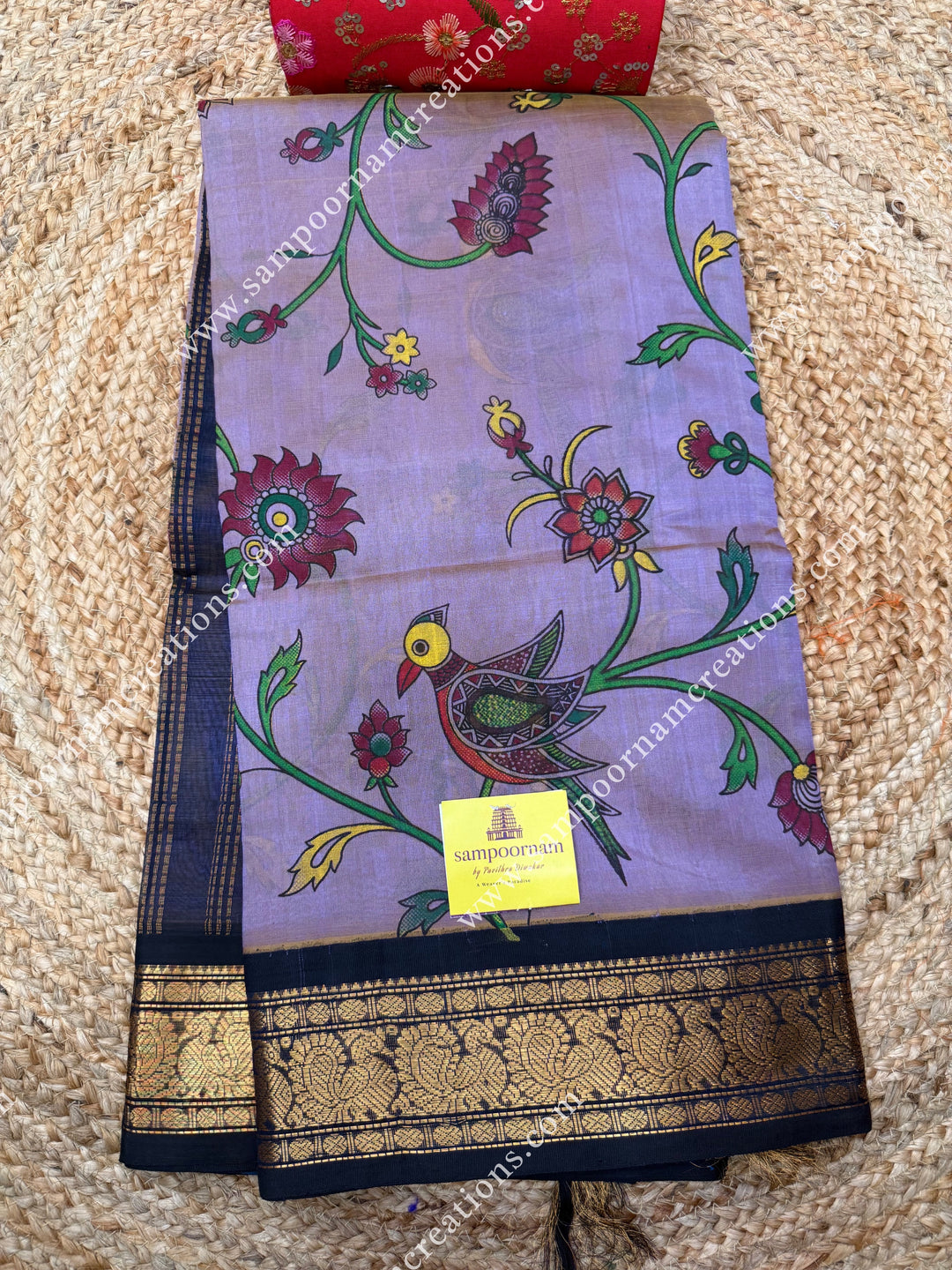 Double Shaded Lilac with Dark Blue , Floral Madhubani  Prints all over the body , Traditional borders and rich Pallu Korvai Silk Cotton Saree
