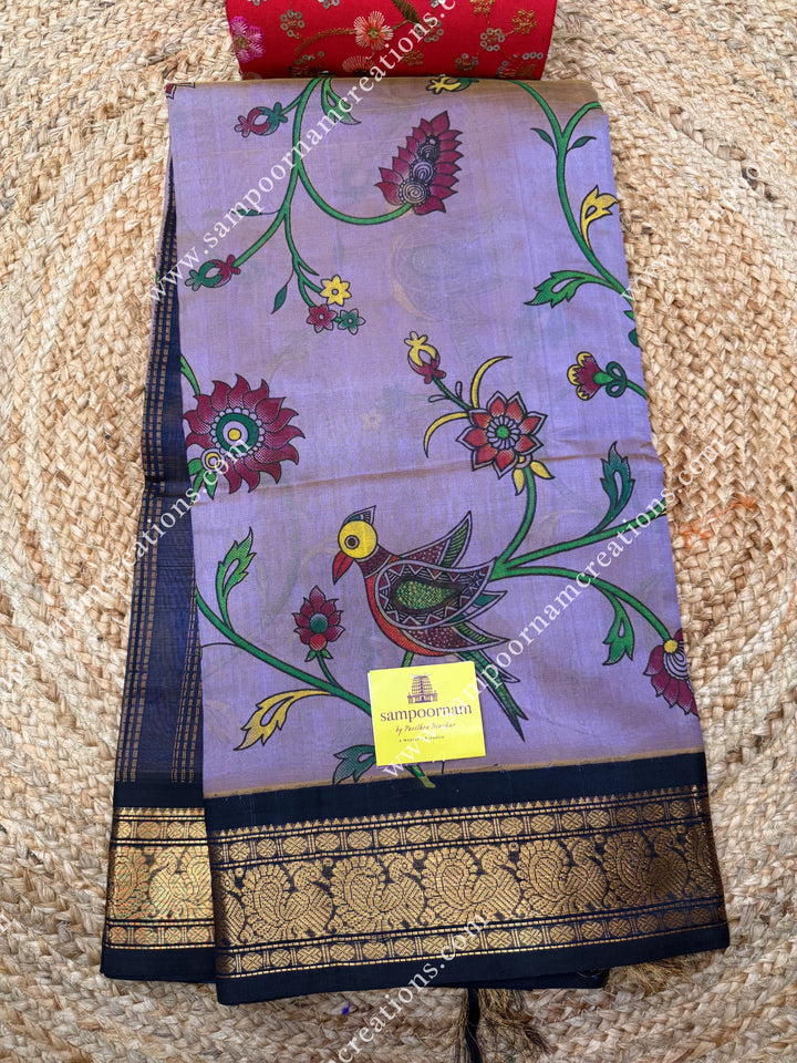 Double Shaded Lilac with Dark Blue , Floral Madhubani  Prints all over the body , Traditional borders and rich Pallu Korvai Silk Cotton Saree