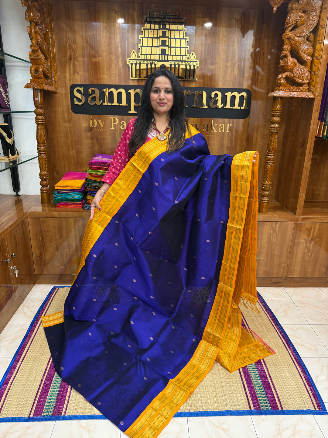 Royal Blue with Manjal , rich  Zari Butta in the body , Rettapet borders and rich Pallu Korvai Silk Cotton Saree