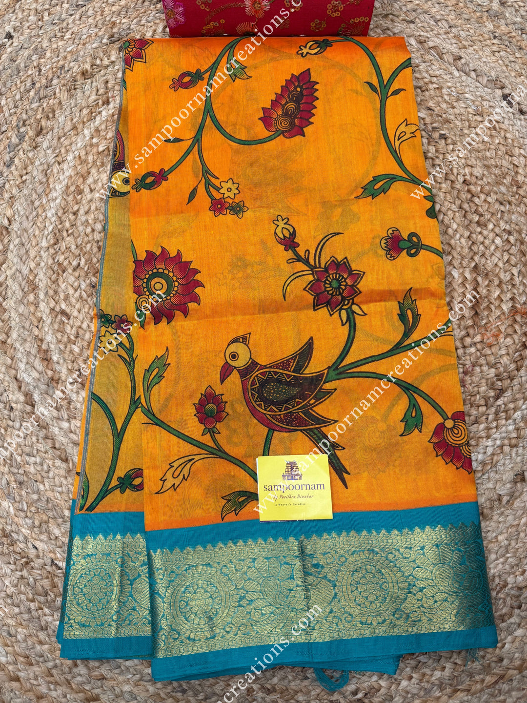 Mambazha Manjal with Turquoise Blue , Floral Madhubani  Prints all over the body , Traditional borders and rich Pallu Korvai Silk Cotton Saree