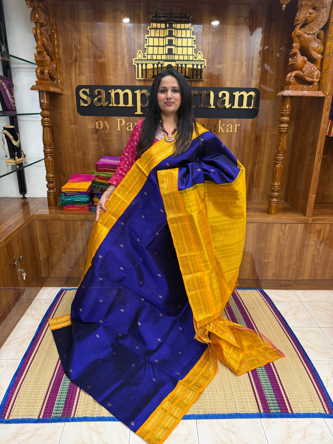 Royal Blue with Manjal , rich  Zari Butta in the body , Rettapet borders and rich Pallu Korvai Silk Cotton Saree