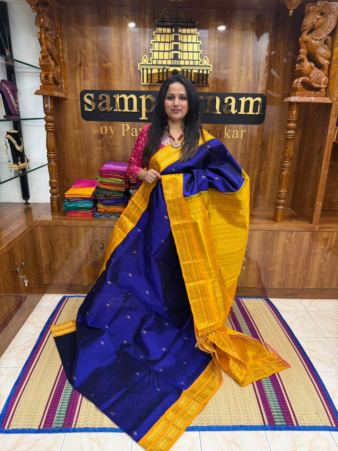 Royal Blue with Manjal , rich  Zari Butta in the body , Rettapet borders and rich Pallu Korvai Silk Cotton Saree