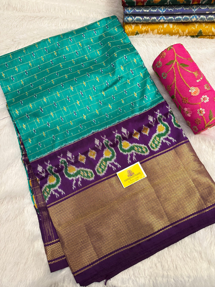 Turquoise Blue with Purple , checks in the body , design the blouse , traditional Kanchi borders and rich Pallu Pochampally Ikkat Silk Saree