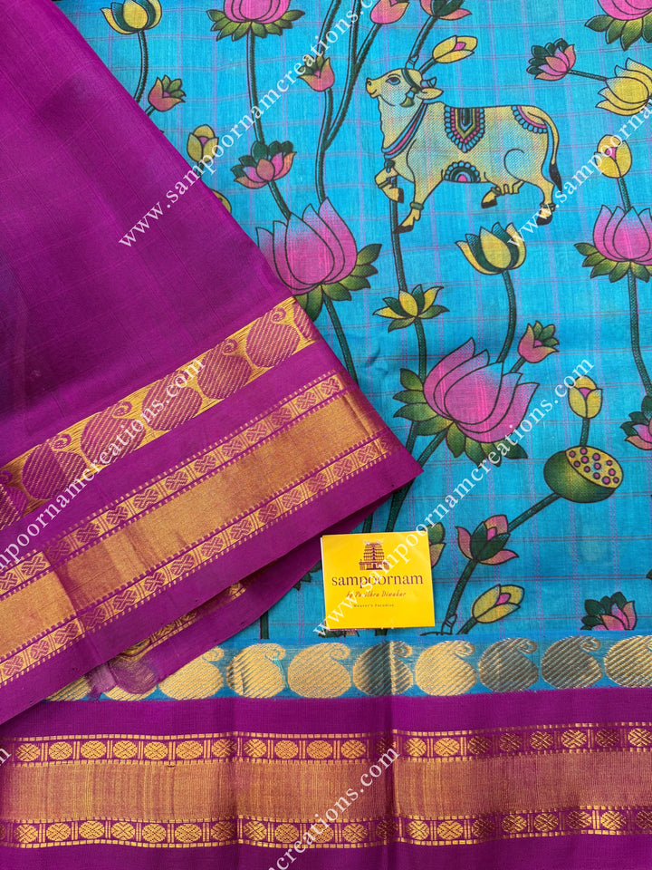Greenish Blue with Magenta ,  Checks in the body and rettapet Borders and  rich Pallu Pichwai Printed Korvai Silk Cotton Saree