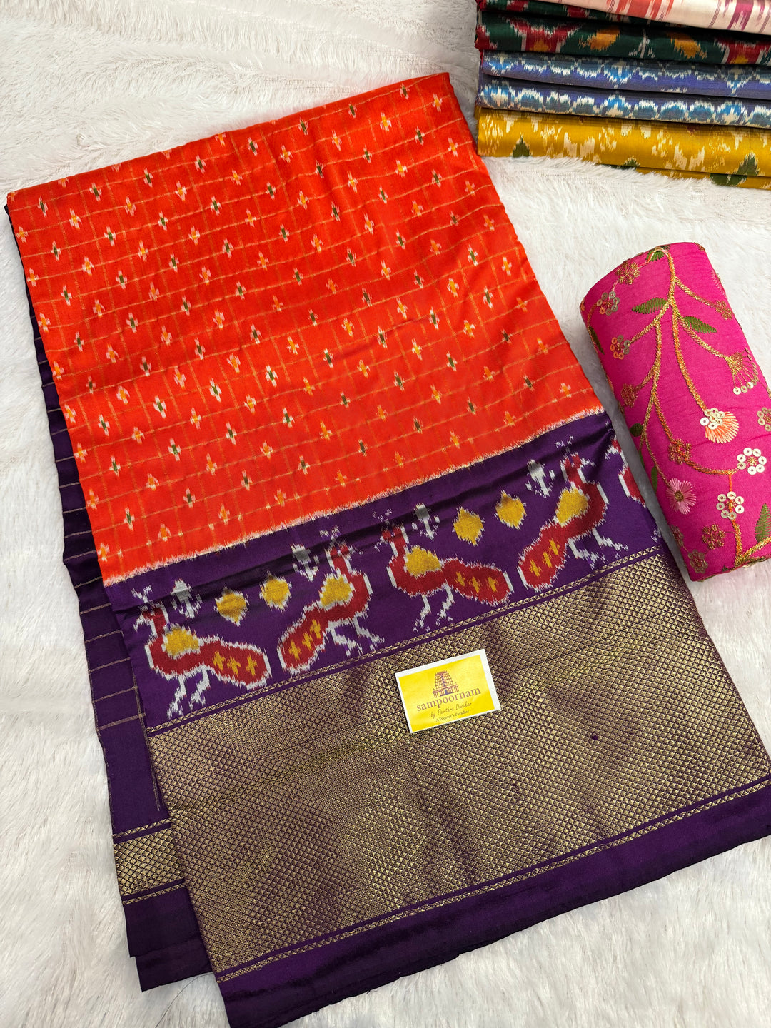 Orange with Purple ,checks in the body , traditional borders , work in blouse and rich Pallu Pochampally Ikkat Silk Saree