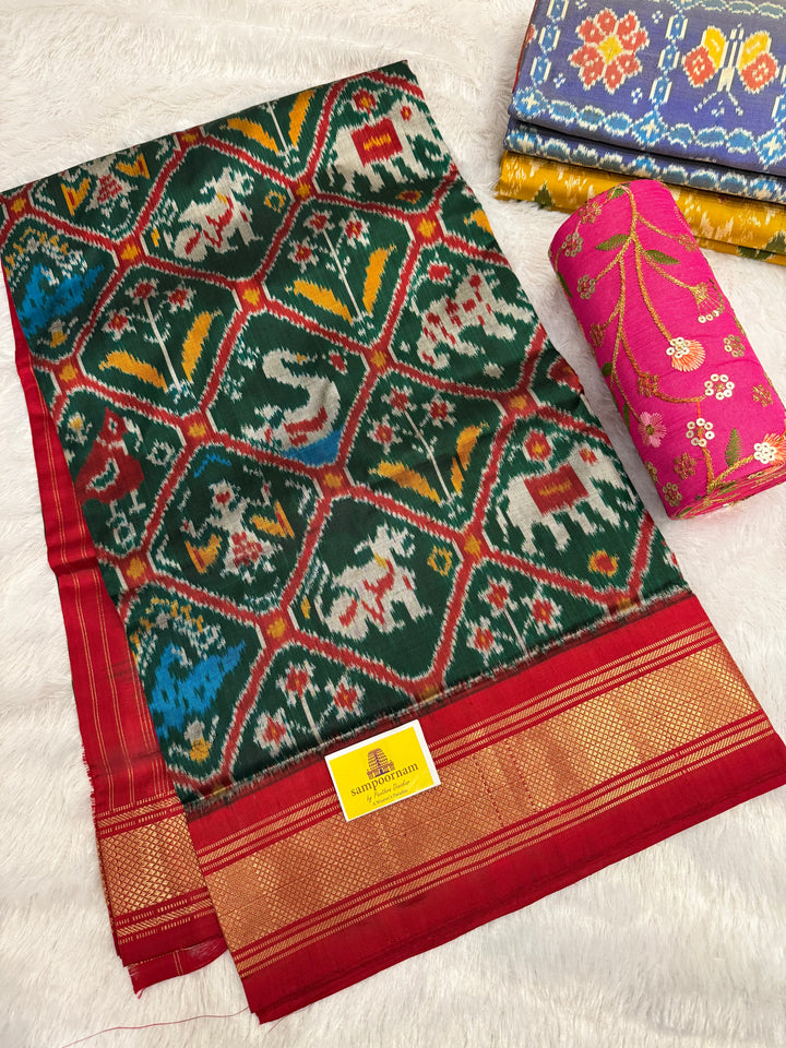 Green with Red , traditional borders and rich Pallu Pochampally Ikkat Silk Saree