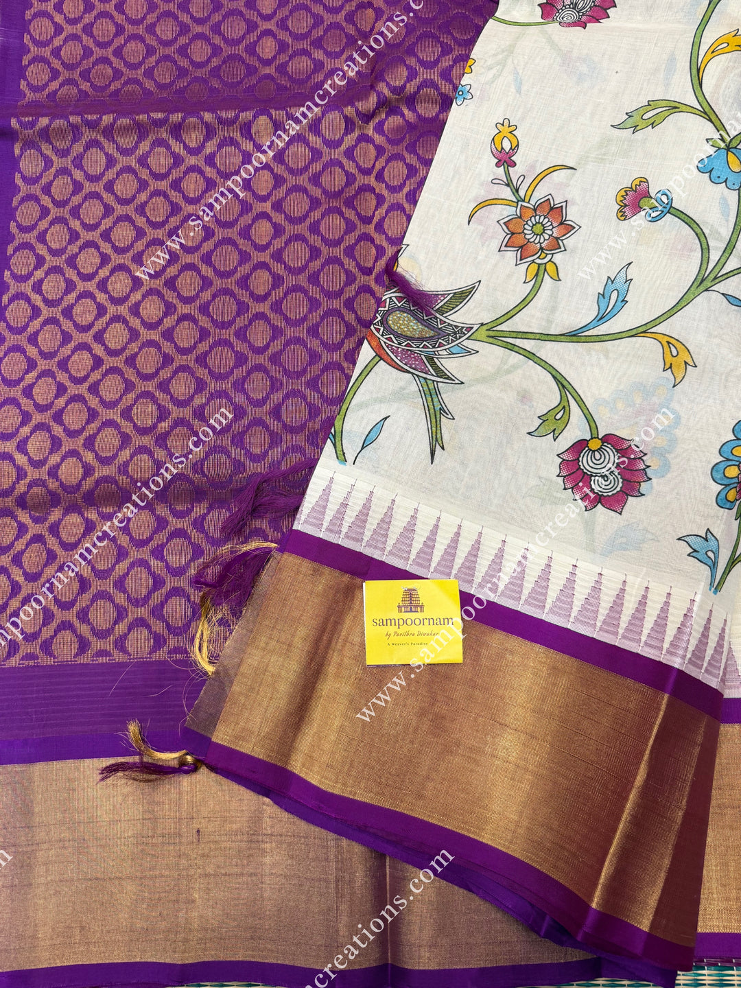 Offwhite with Dark Magenta , Floral Madhubani  Prints all over the body , Tissue Border with Temple design  and Rich Pallu Korvai Silk Cotton Saree