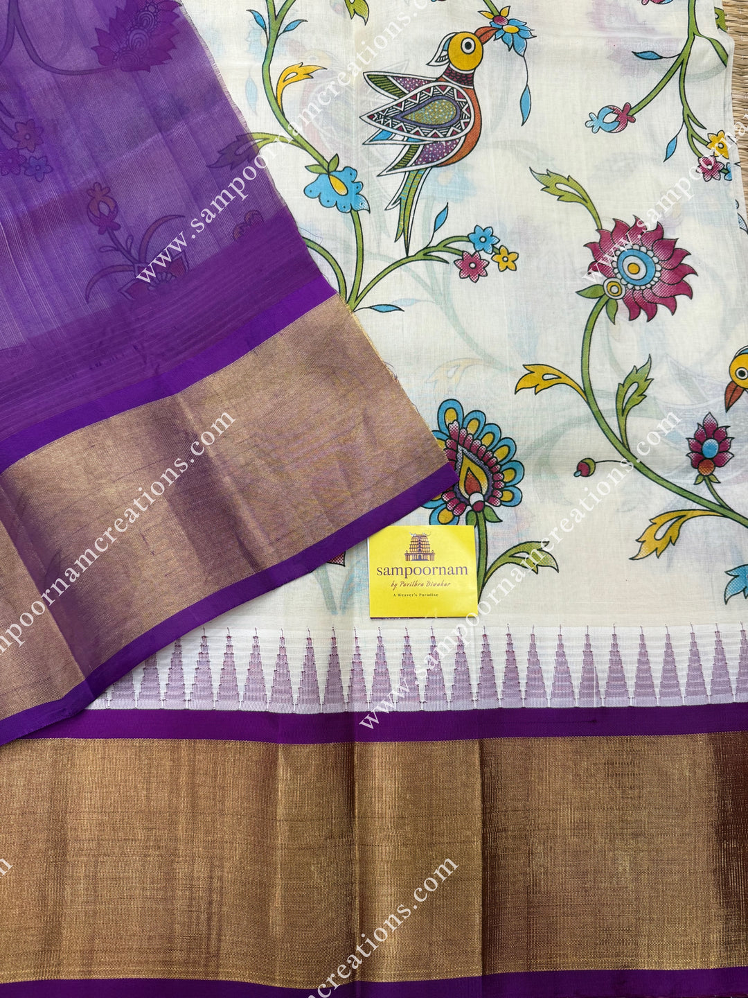 Offwhite with Dark Magenta , Floral Madhubani  Prints all over the body , Tissue Border with Temple design  and Rich Pallu Korvai Silk Cotton Saree