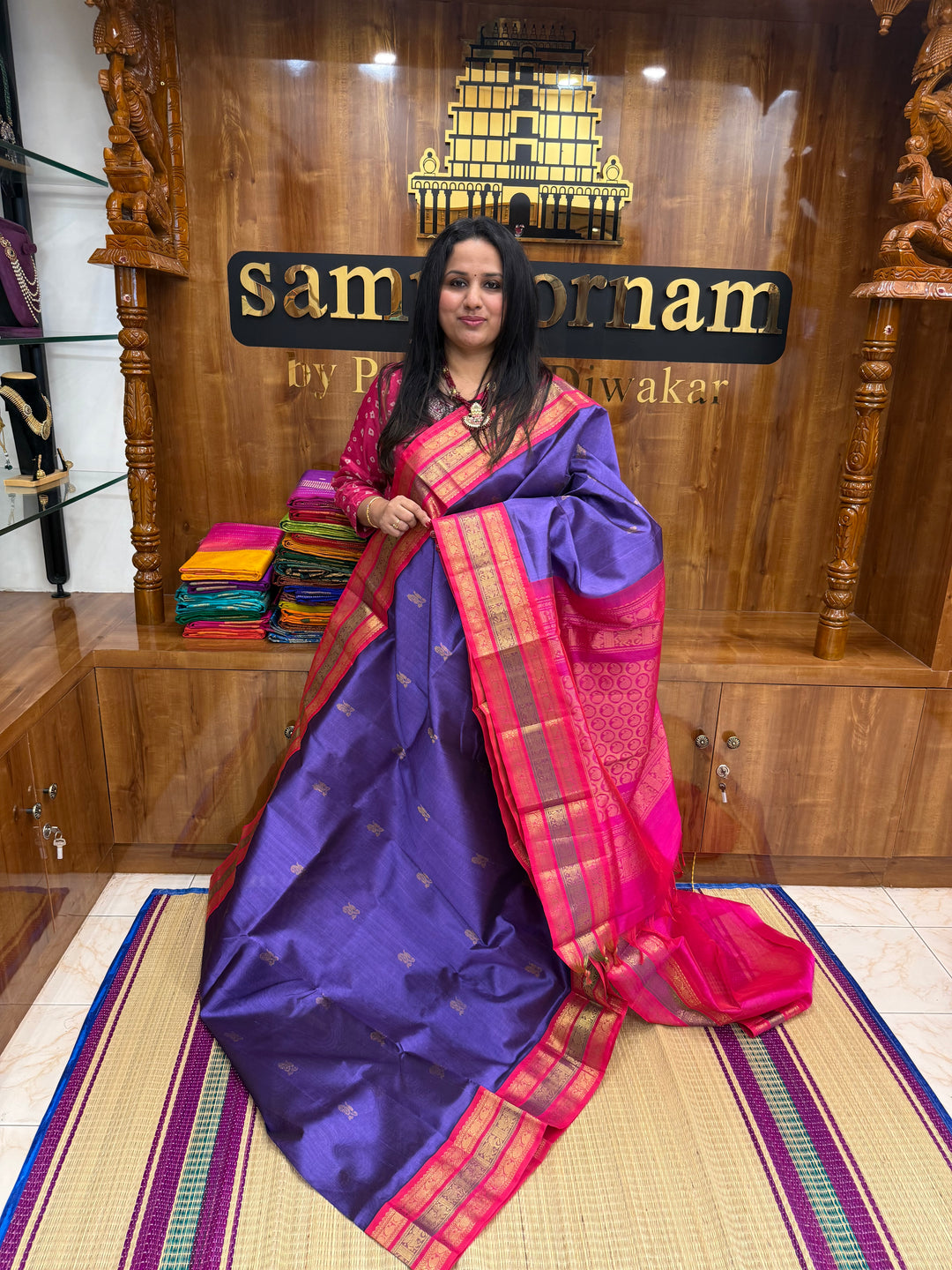 Lavender with Pink , rich Mango Zari Butta in the body , traditional Kanchi borders and rich Pallu Korvai Silk Cotton Saree