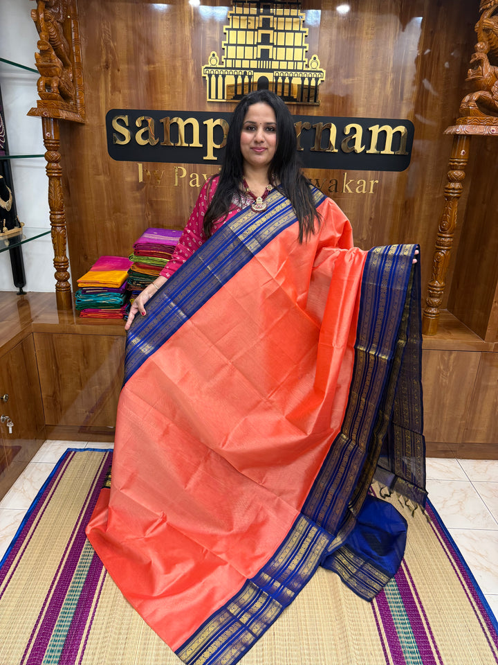 Kanakambaram with Blue  , Traditional Kanchi  borders and Rich Pallu Korvai Silk Cotton Saree