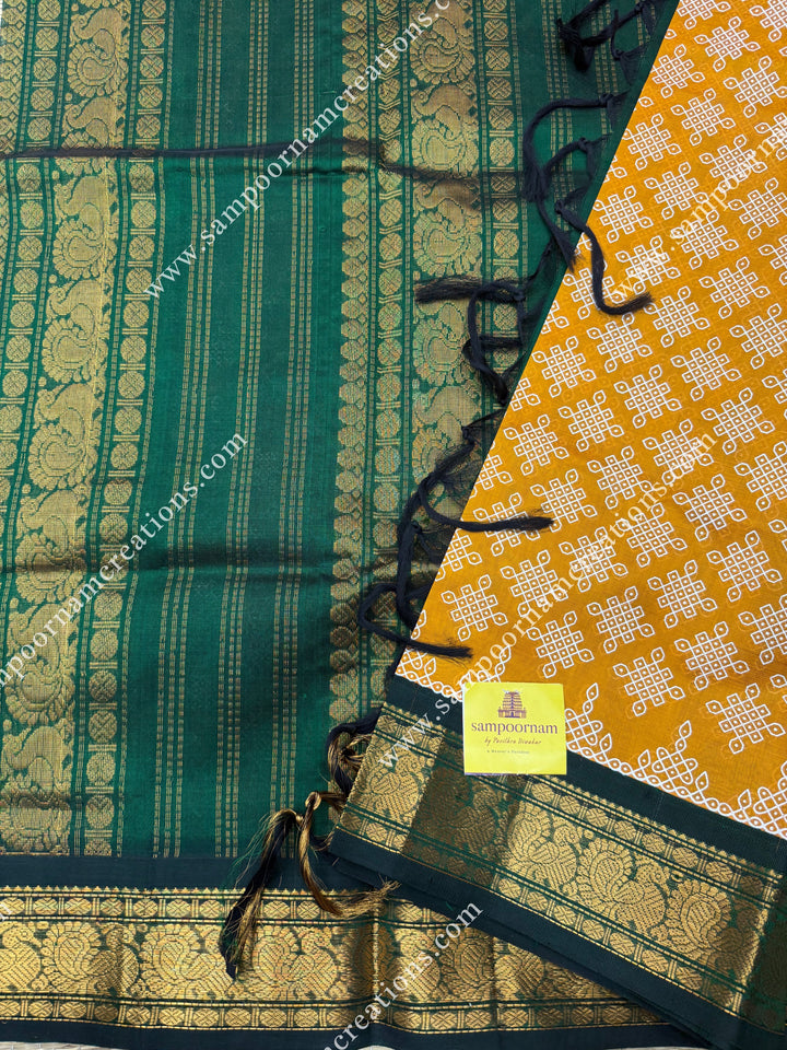 Gold Yellow with Green , Kolam Prints all over the body , traditional borders and rich Pallu Korvai Silk Cotton Saree