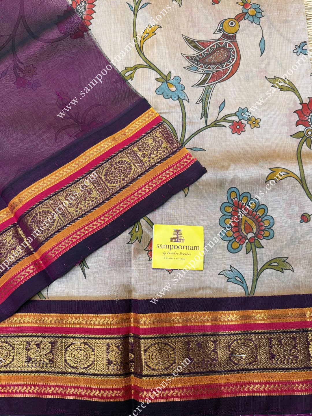 Gold with Wine , Floral Madhubani  Prints all over the body , Traditional borders and rich Pallu Korvai Silk Cotton Saree