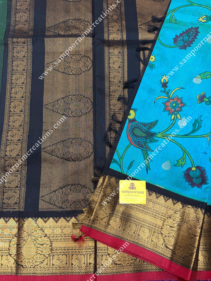 Rexona Green with Black ,  Floral Madhubani  Prints all over the body , Traditional one side long borders and rich Pallu Korvai Silk Cotton Saree