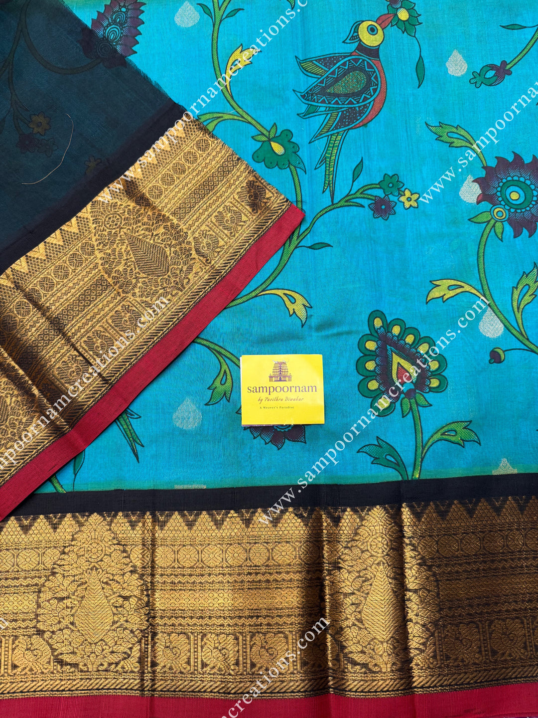 Rexona Green with Black ,  Floral Madhubani  Prints all over the body , Traditional one side long borders and rich Pallu Korvai Silk Cotton Saree