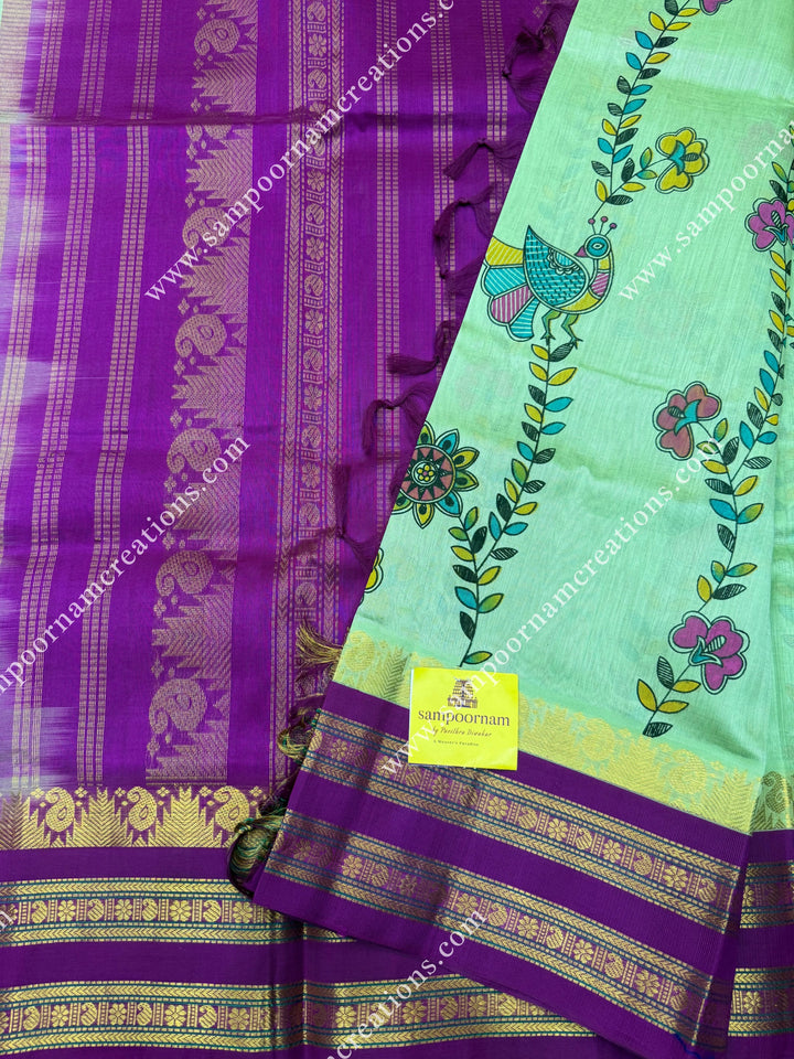 Pastel Green  with Megenta, Floral Madhubani  Prints all over the body , rettapet borders with temple design and rich Pallu Korvai Silk Cotton Saree