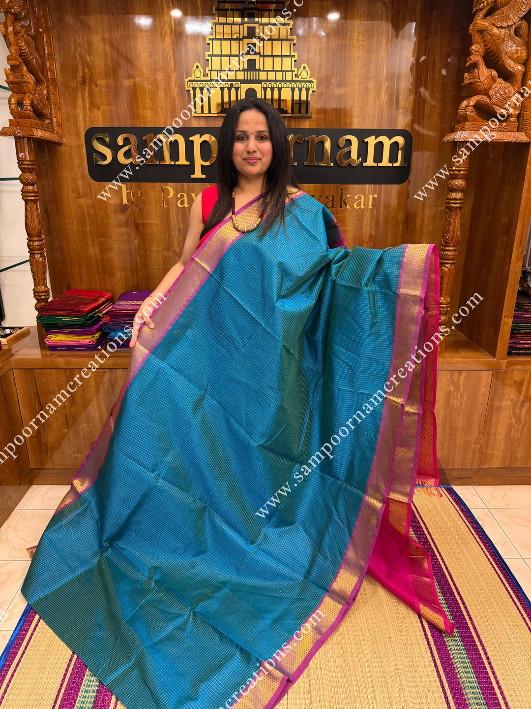 Turquoise Blue with Pink , Rich Annam Zari Butta in the body , traditional borders and rich Pallu Silk Cotton Saree