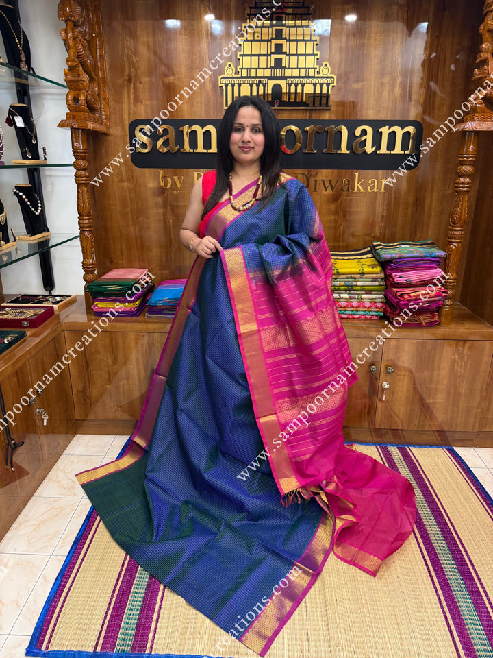 Mayilkazuthu with Magenta , Rich Zari Checks in the body , traditional borders and rich Pallu Silk Cotton Sarees