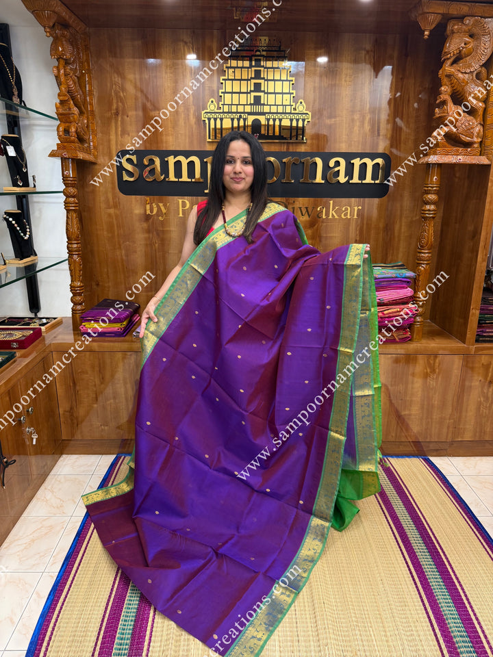 Vadamalli with Parrot Green  , Rich Zari Butta in the body , traditional borders and rich Pallu Silk Cotton Saree