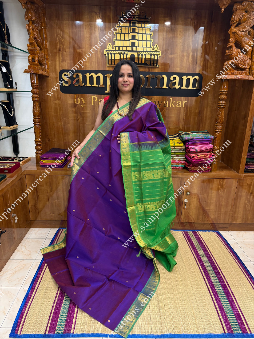 Vadamalli with Parrot Green  , Rich Zari Butta in the body , traditional borders and rich Pallu Silk Cotton Saree