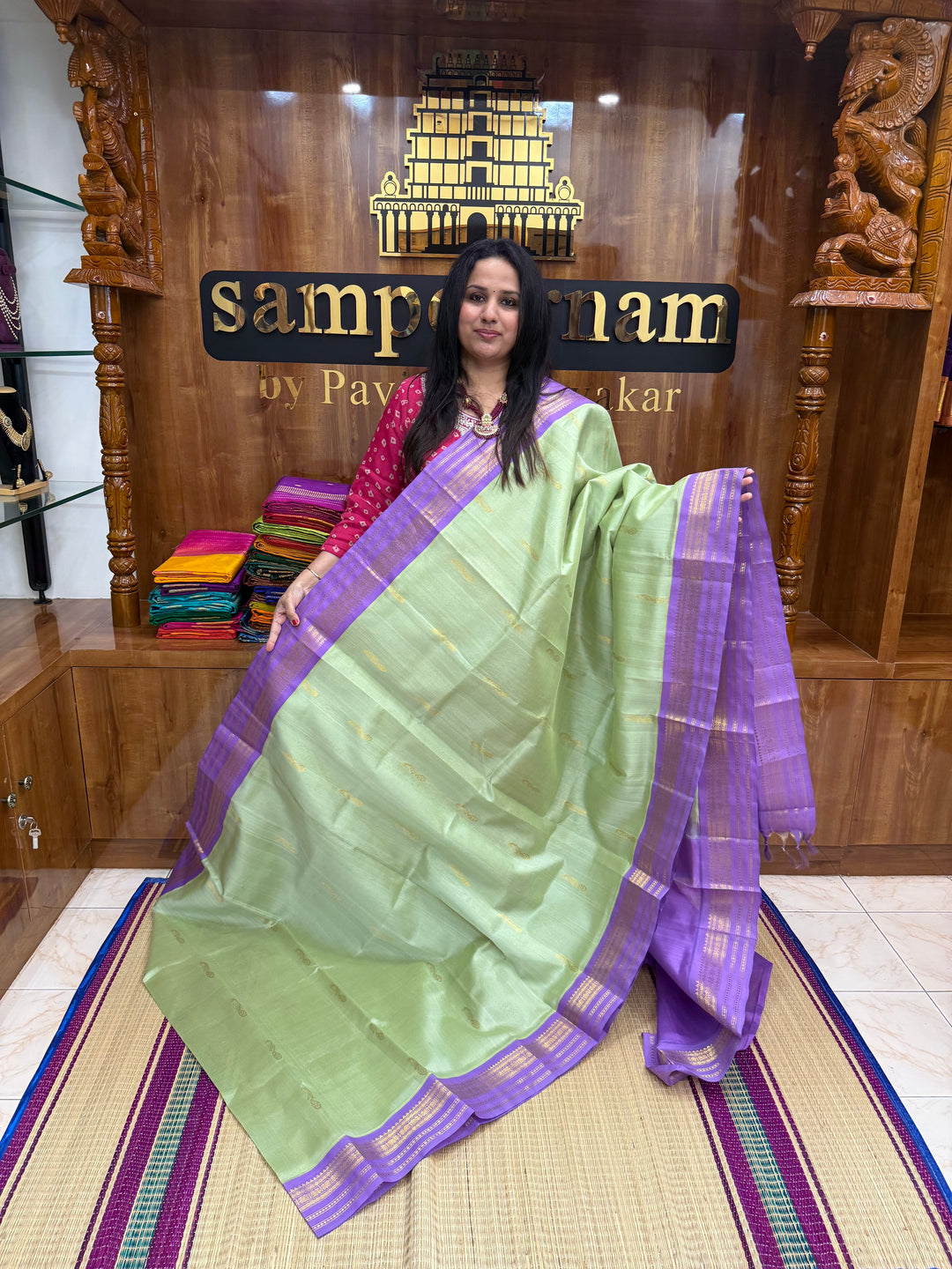 Pista Green with Lilac , rich Mayil  Zari Butta in the body , Rettapet  borders and rich Pallu Korvai Silk Cotton Saree