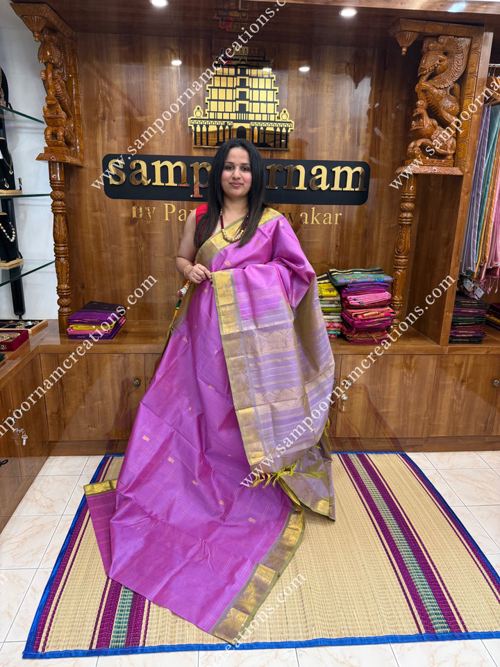 Bright Lilac with Pale Lavender , Rich Annam and Rudraksh Zari Butta and Checks in the body , traditional borders and rich Pallu Silk Cotton Saree