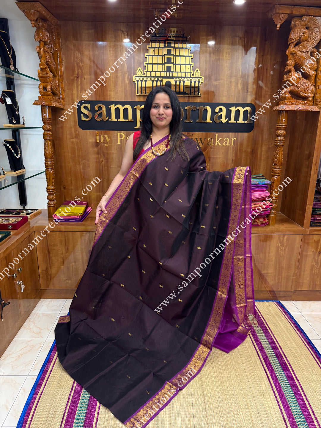 Dark Brown with Magenta , Rich Annam Zari Butta in the body , traditional borders and rich Pallu Silk Cotton Saree