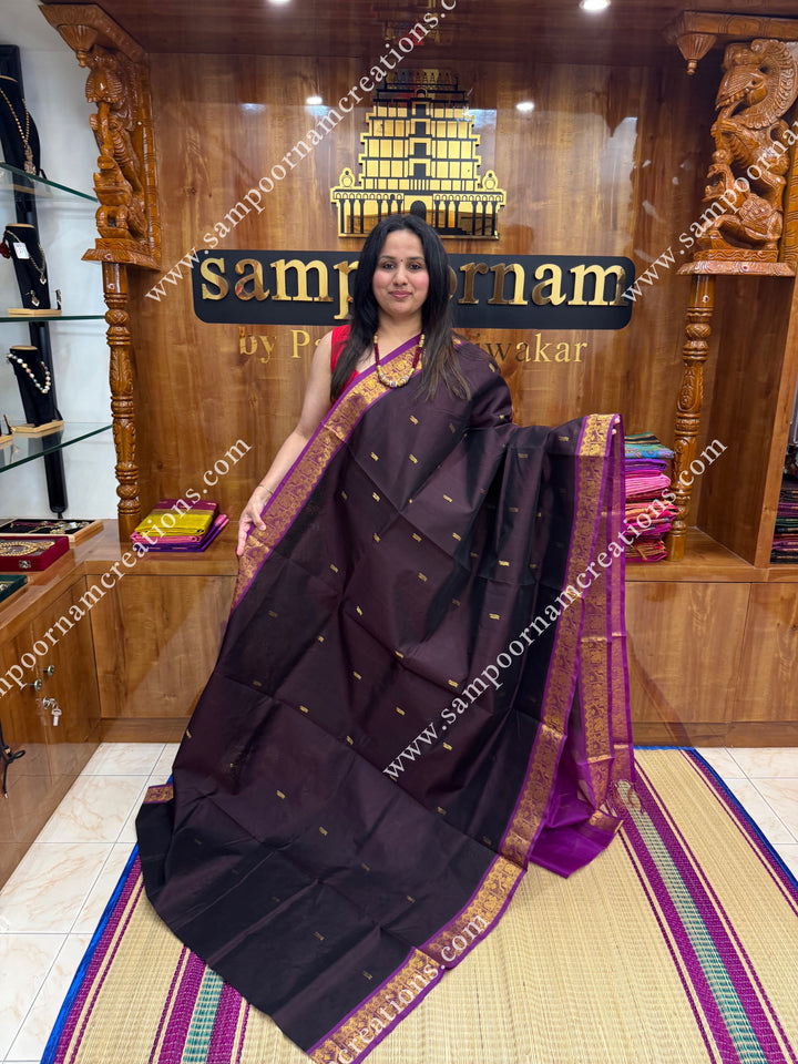 Dark Brown with Magenta , Rich Annam Zari Butta in the body , traditional borders and rich Pallu Silk Cotton Saree