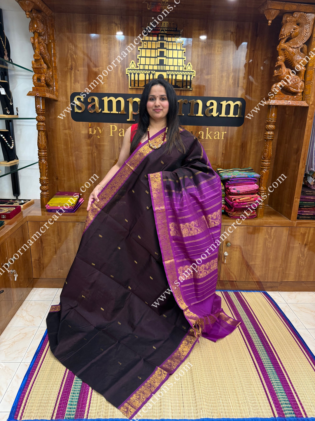 Dark Brown with Magenta , Rich Annam Zari Butta in the body , traditional borders and rich Pallu Silk Cotton Saree