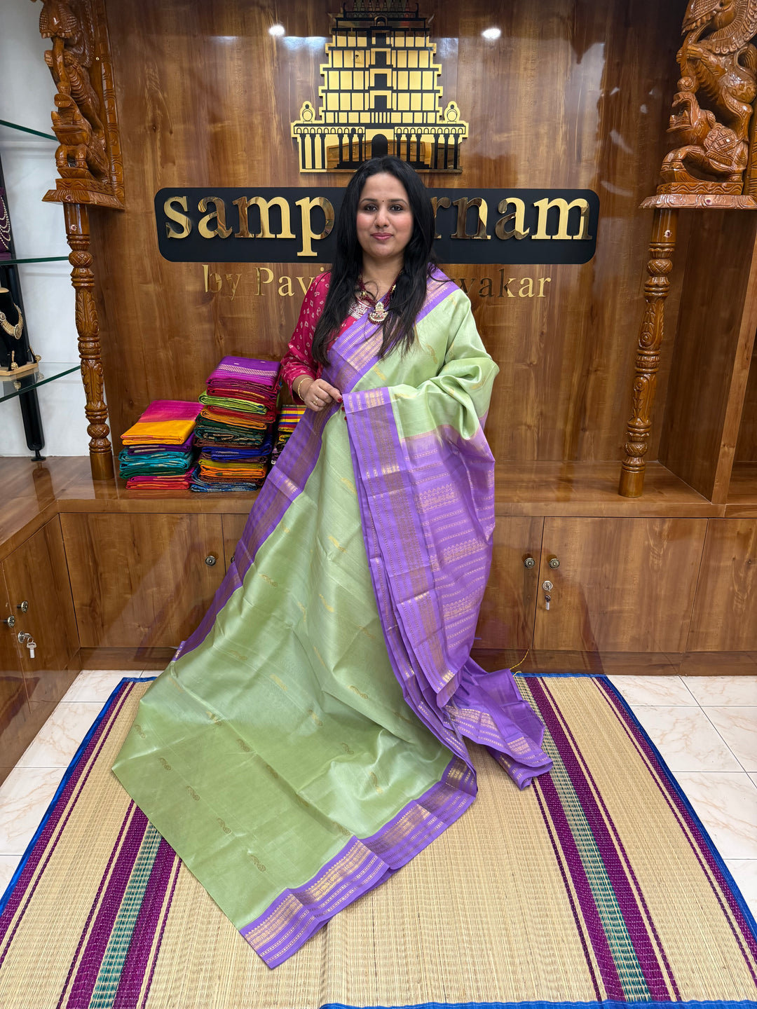 Pista Green with Lilac , rich Mayil  Zari Butta in the body , Rettapet  borders and rich Pallu Korvai Silk Cotton Saree