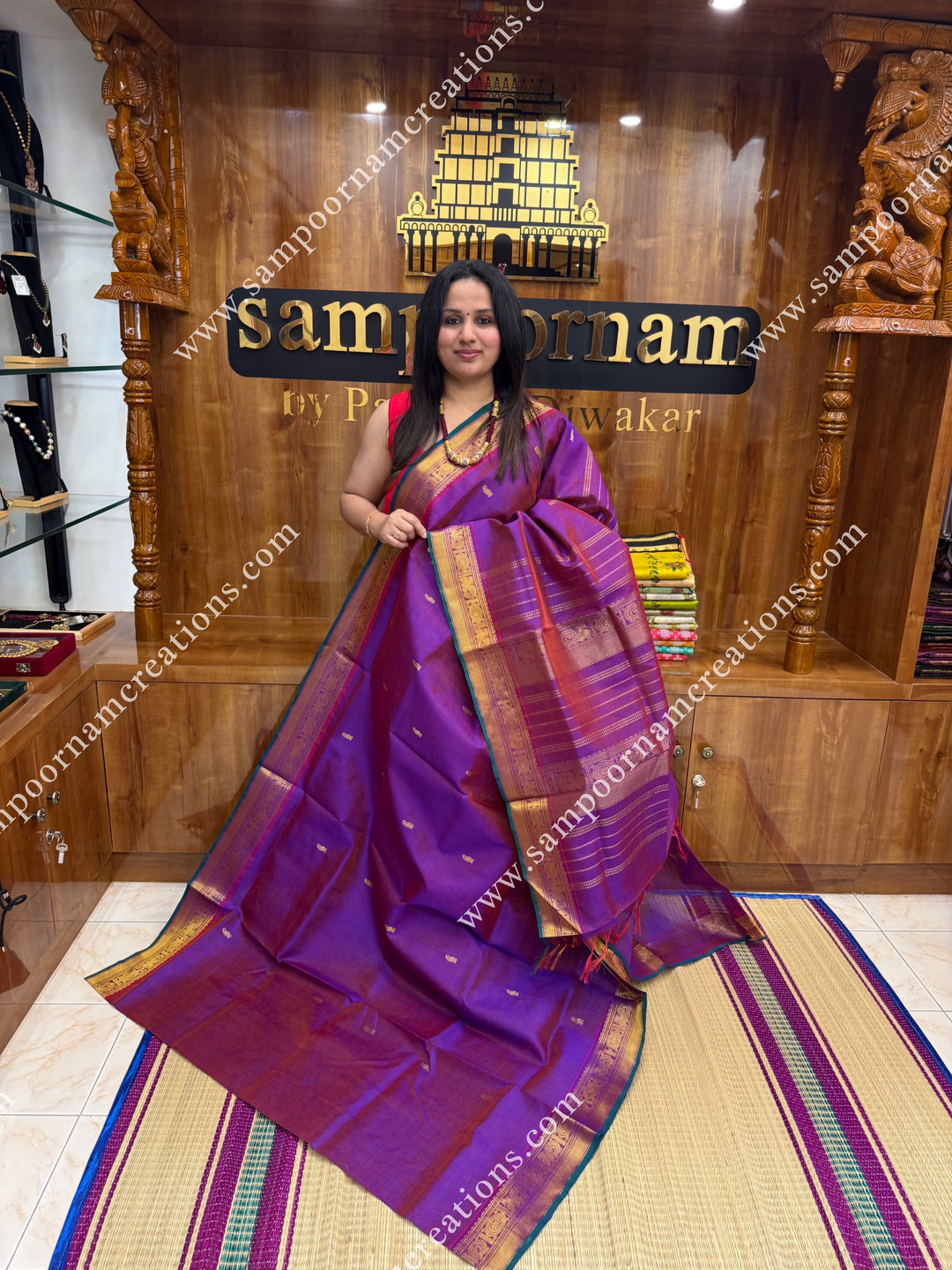 Vadamalli , Green Selvedge , Vairaoosi Zari lines and Mango Zari Butta in the body , traditional borders and rich Pallu Silk Cotton Sarees