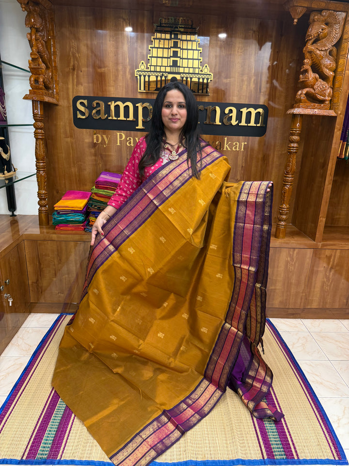 Fenugreek Vendhayam with Purple , rich Mango Zari Butta in the body , traditional Kanchi borders  and rich Pallu Korvai Silk Cotton Saree