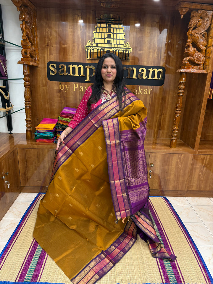 Fenugreek Vendhayam with Purple , rich Mango Zari Butta in the body , traditional Kanchi borders  and rich Pallu Korvai Silk Cotton Saree