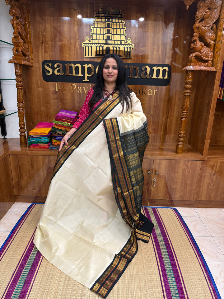 Offwhite with Bottle Green  , Rettapet borders and Rich Pallu Korvai Silk Cotton Saree