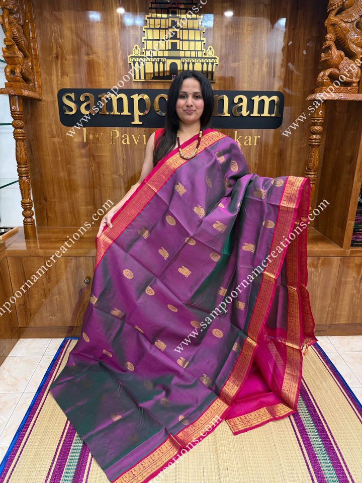 Double Shaded Lilac with Pink , Rich Annam and Chakram  Zari Butta in the body , traditional borders and rich Pallu Silk Cotton Saree