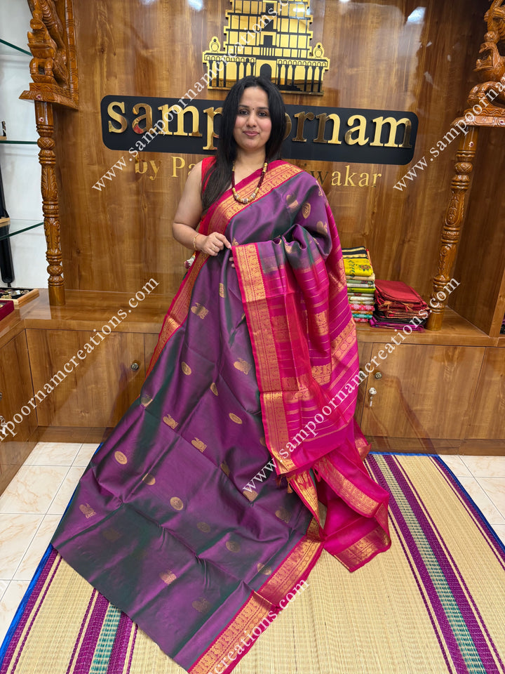 Double Shaded Lilac with Pink , Rich Annam and Chakram  Zari Butta in the body , traditional borders and rich Pallu Silk Cotton Saree