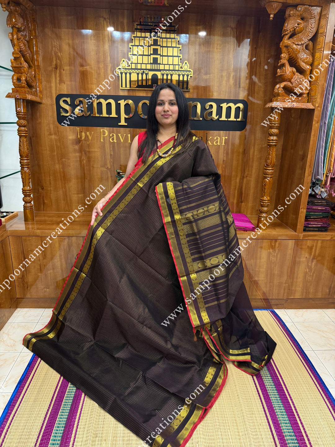 Dark Brown , Red Selvedge , Rich Zari Checks in the body , rettapet borders and rich Pallu Silk Cotton Sarees