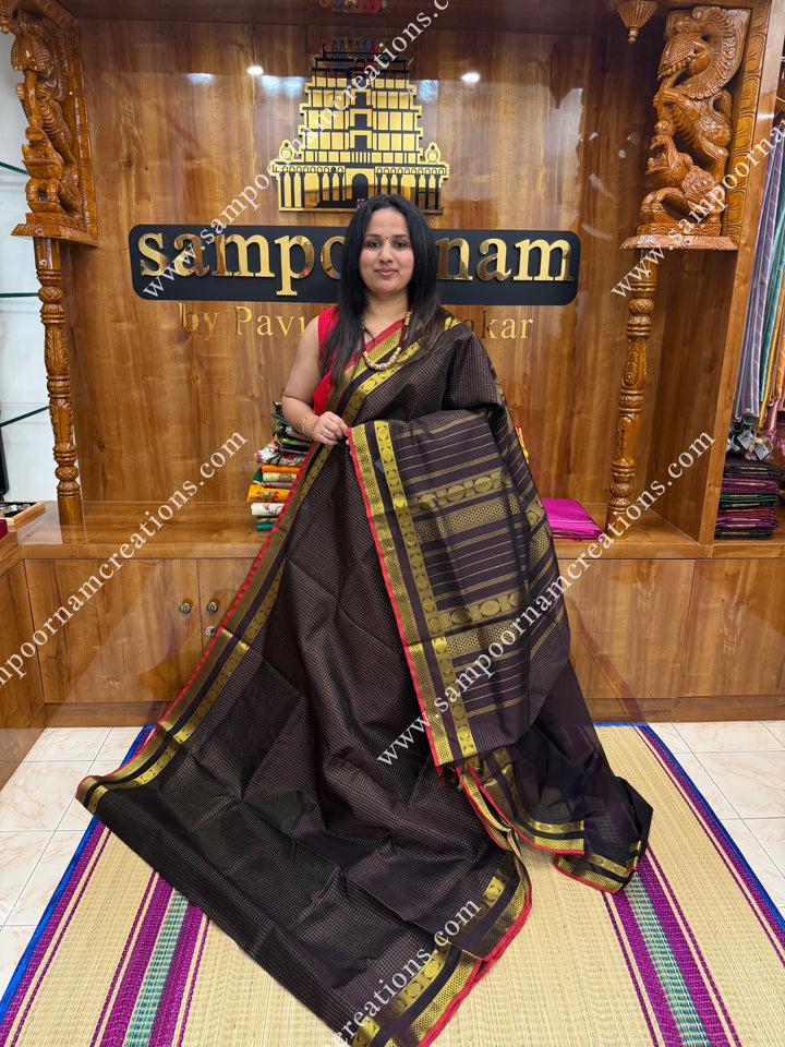 Dark Brown , Red Selvedge , Rich Zari Checks in the body , rettapet borders and rich Pallu Silk Cotton Sarees