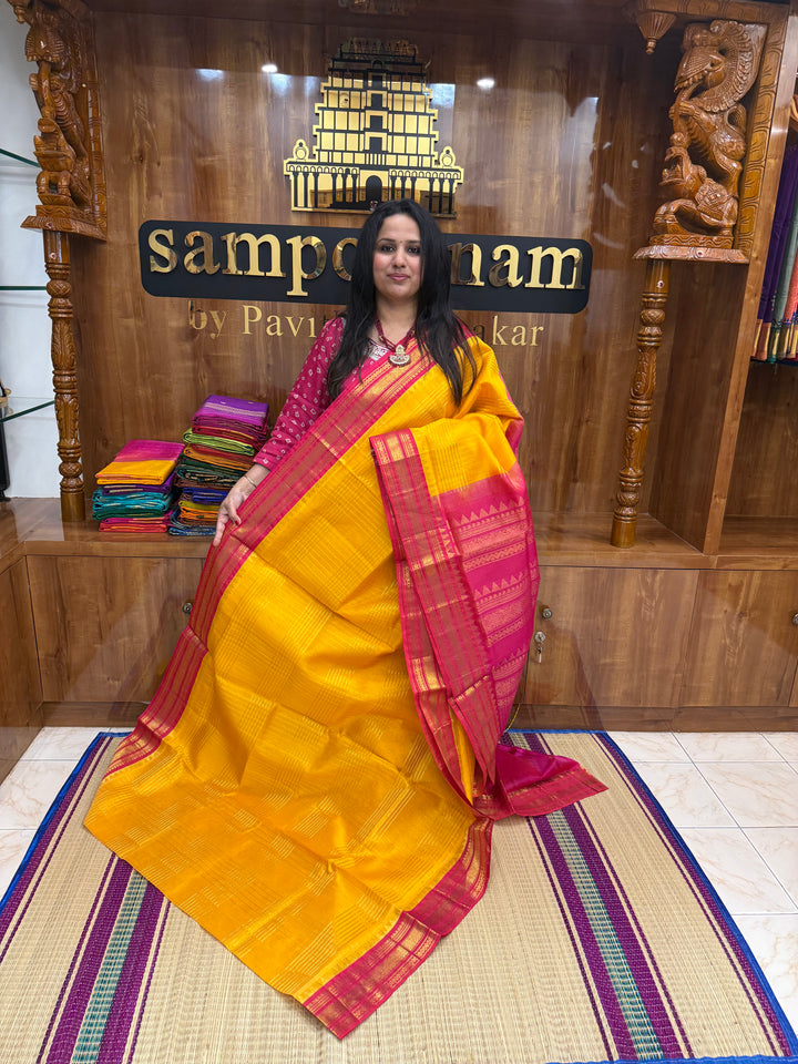 Mambazha Manjal with Pink , rich Zari Muthu Kattam  in the body , traditional borders and rich Pallu Korvai Silk Cotton Saree