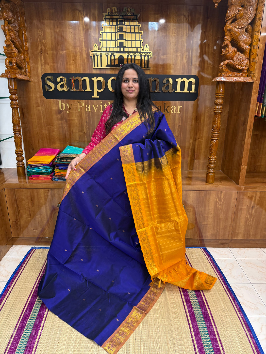 Ms Blue with Mustard , rich Zari butta in the body , Traditional Big Borders and rich Pallu  Silk Cotton Saree