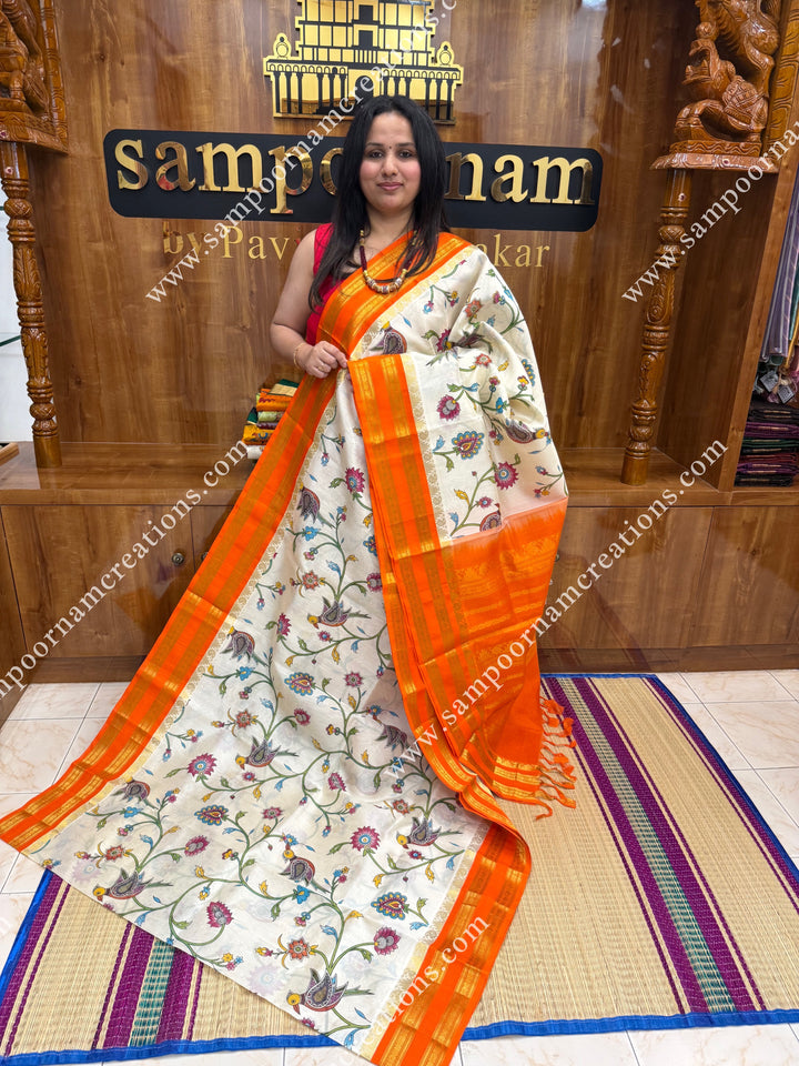 Offwhite with Orange , Floral Madhubani  Prints all over the body , rettapet borders with temple design and rich Pallu Korvai Silk Cotton Saree