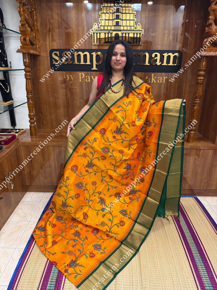 Mambazha Manjal with Dark Green , Floral Madhubani  Prints all over the body , Tissue borders with Temple design and rich Pallu Korvai Silk Cotton Saree