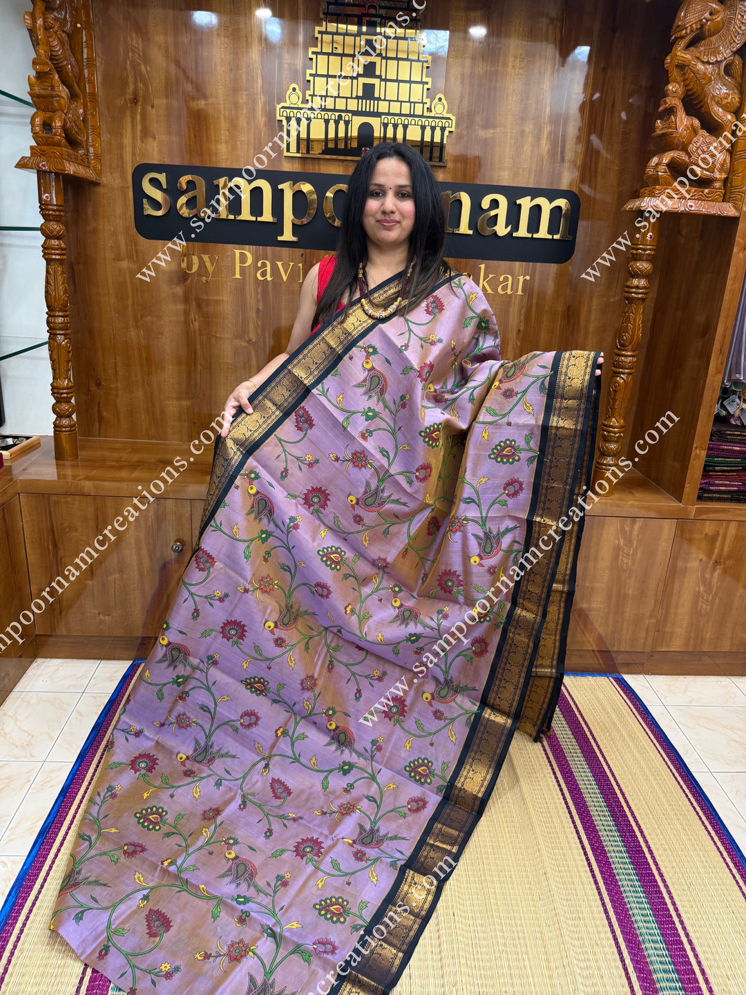 Double Shaded Lilac with Dark Blue , Floral Madhubani  Prints all over the body , Traditional borders and rich Pallu Korvai Silk Cotton Saree