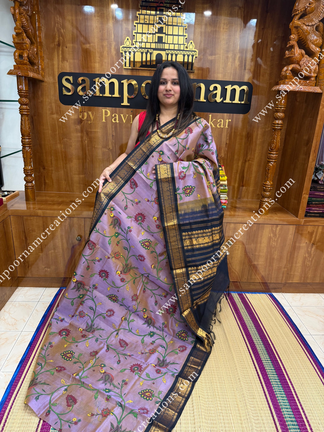 Double Shaded Lilac with Dark Blue , Floral Madhubani  Prints all over the body , Traditional borders and rich Pallu Korvai Silk Cotton Saree