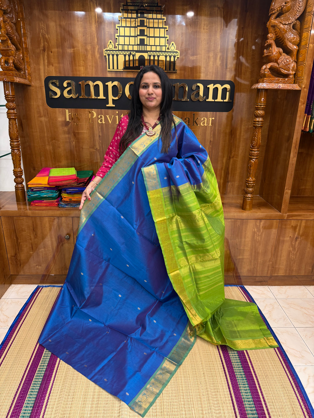 Coppersulfate Blue with Green , rich Zari butta in the body , Traditional Big Borders and rich Pallu  Silk Cotton Saree