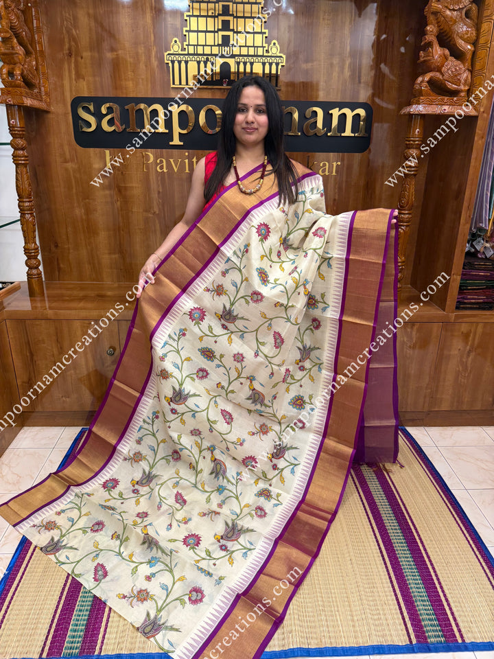 Offwhite with Dark Magenta , Floral Madhubani  Prints all over the body , Tissue Border with Temple design  and Rich Pallu Korvai Silk Cotton Saree
