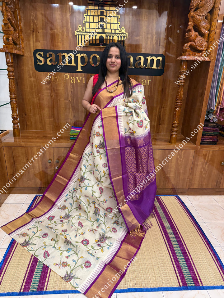 Offwhite with Dark Magenta , Floral Madhubani  Prints all over the body , Tissue Border with Temple design  and Rich Pallu Korvai Silk Cotton Saree