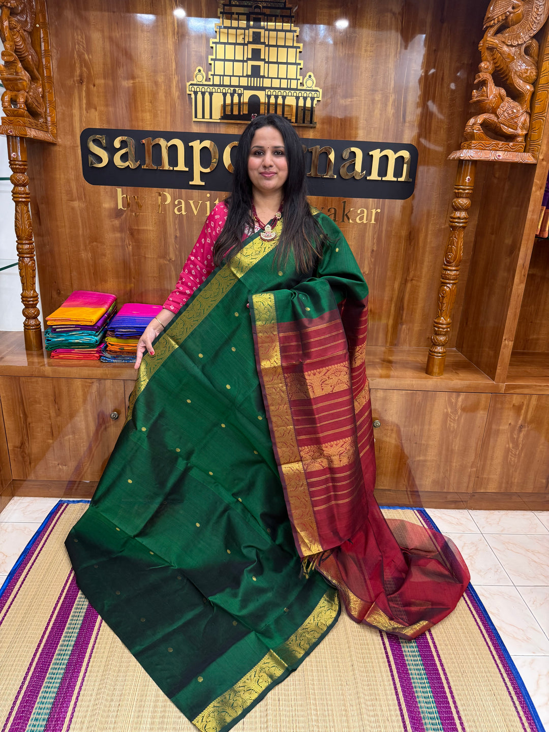 Green with Maroon  , rich Zari butta in the body , Traditional Big Borders and rich Pallu  Silk Cotton Saree