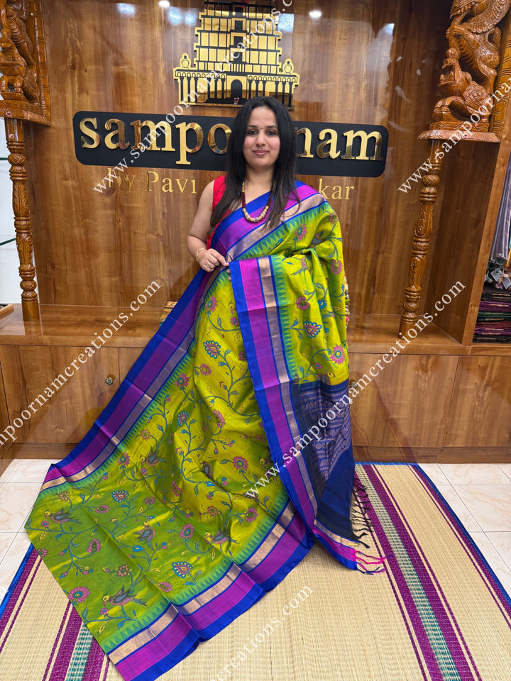 Sneha Green with Blue   , Pichwai  Prints all over the body , Triple Border with Temple design  and Rich Pallu Korvai Silk Cotton Saree