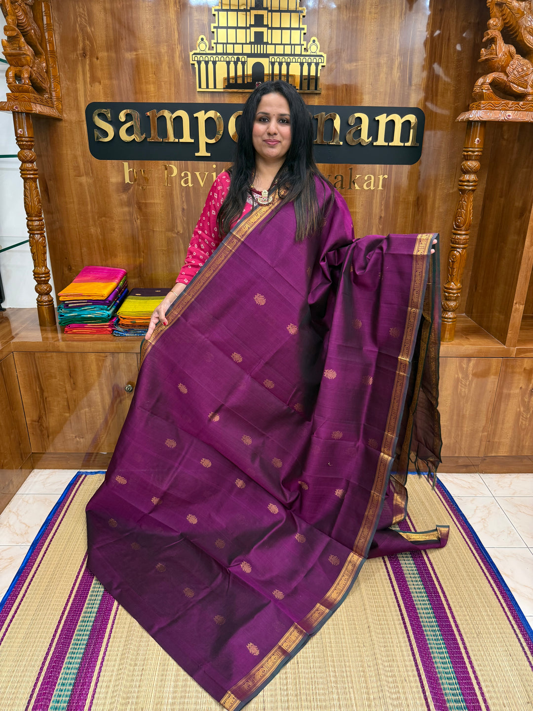 Wine with Green Selvedge , rich two side Peacock Zari butta in the body , Traditional borders rich Pallu Silk Cotton Saree