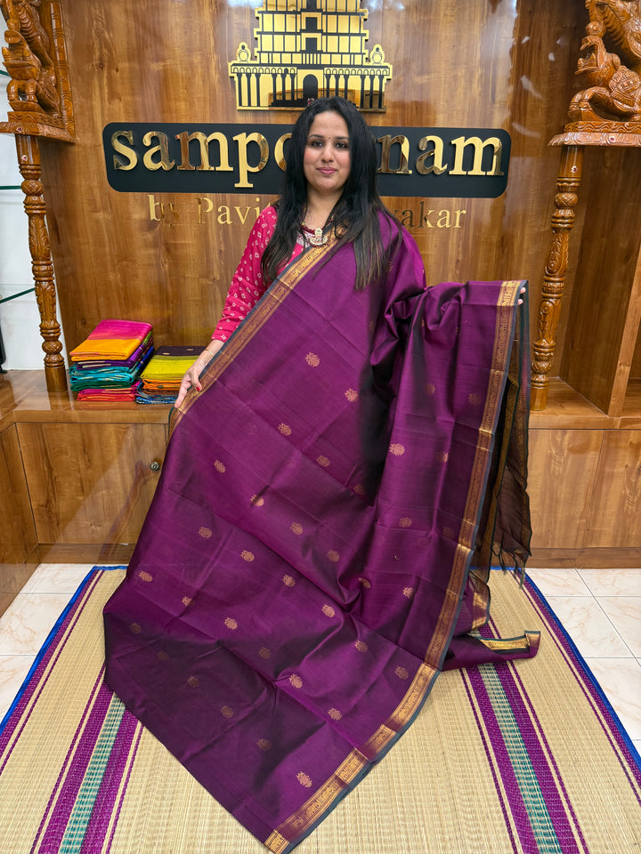 Wine with Green Selvedge , rich two side Peacock Zari butta in the body , Traditional borders rich Pallu Silk Cotton Saree